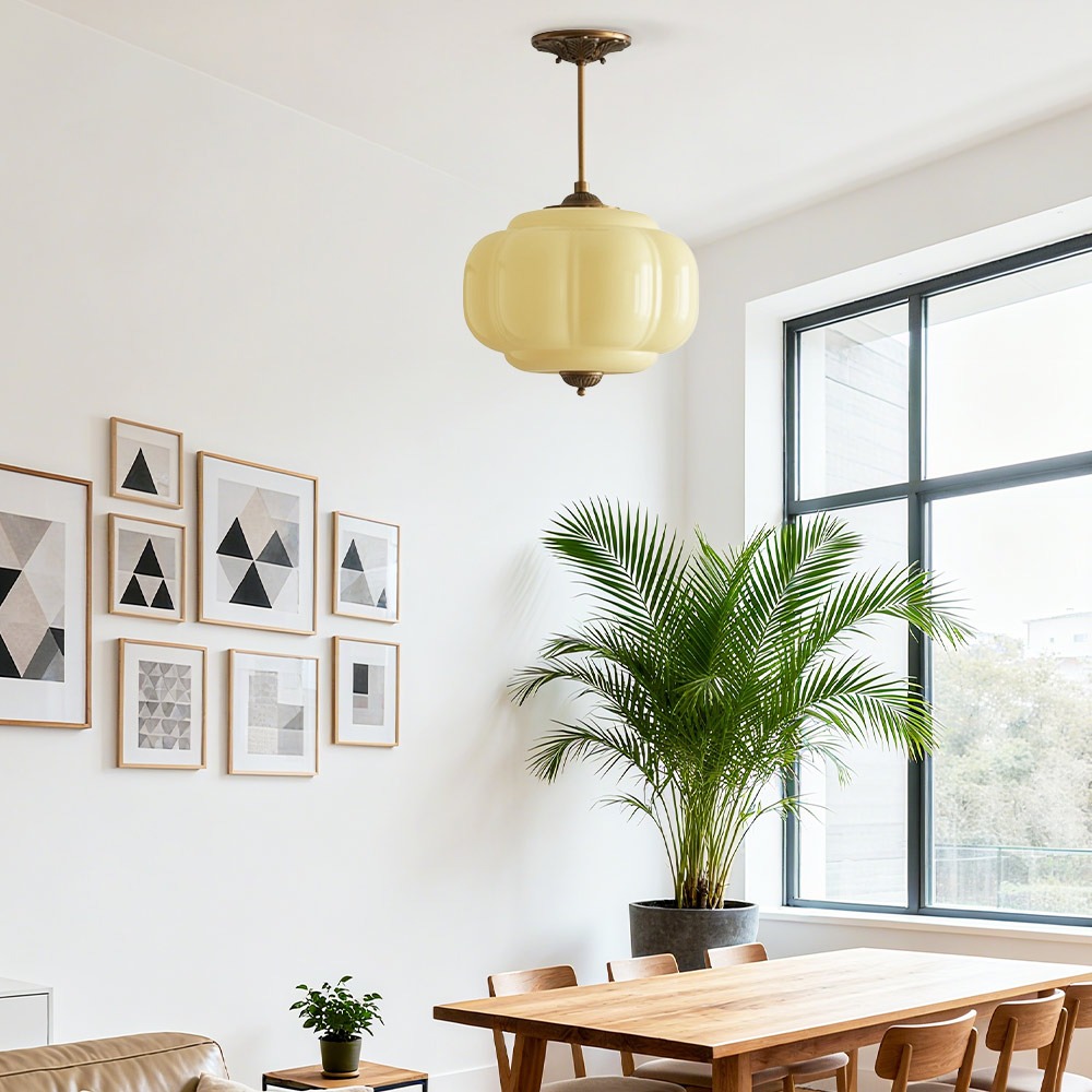 Yellow Eloise pendant in a bright dining space
