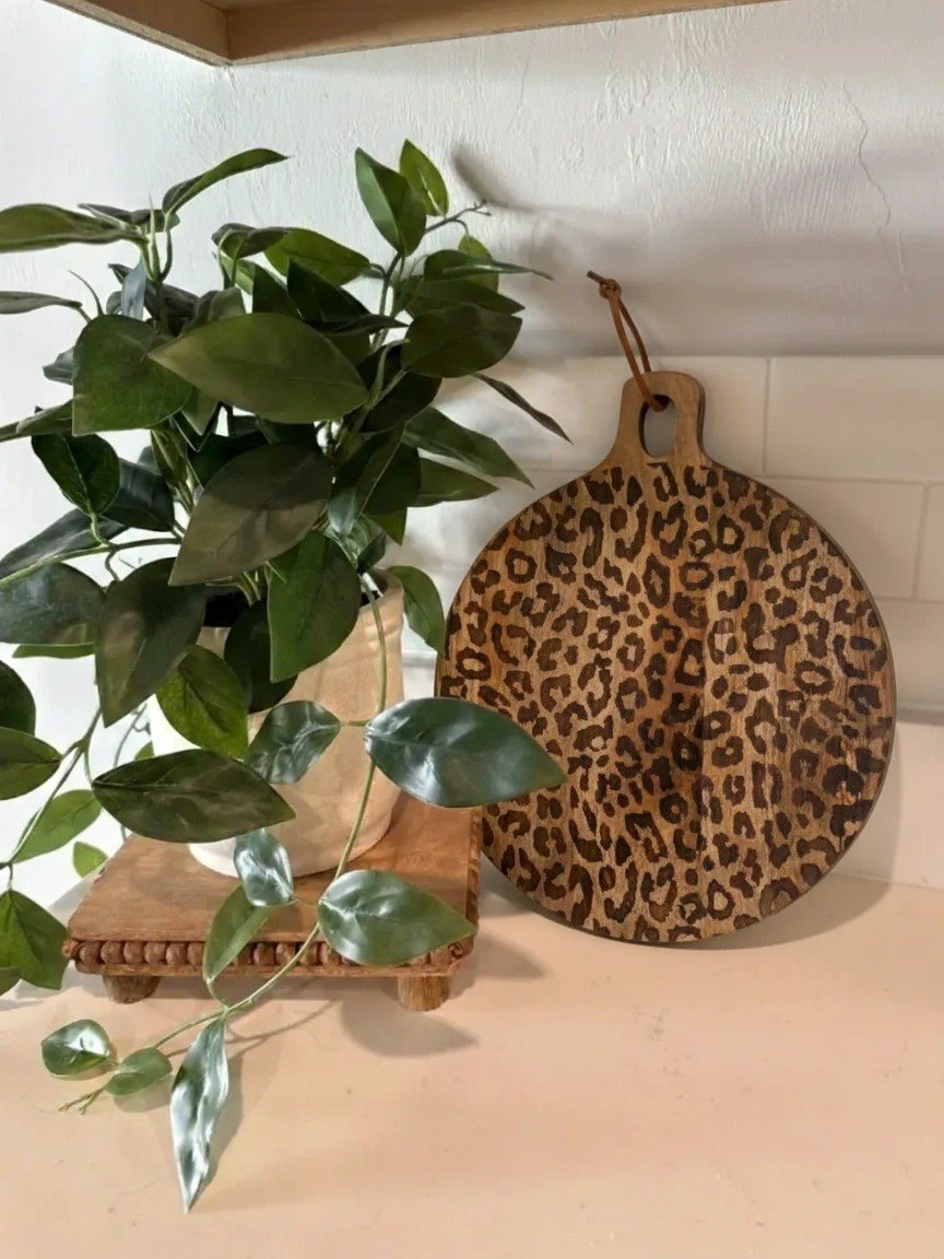Customer photo of leopard print board with plant
