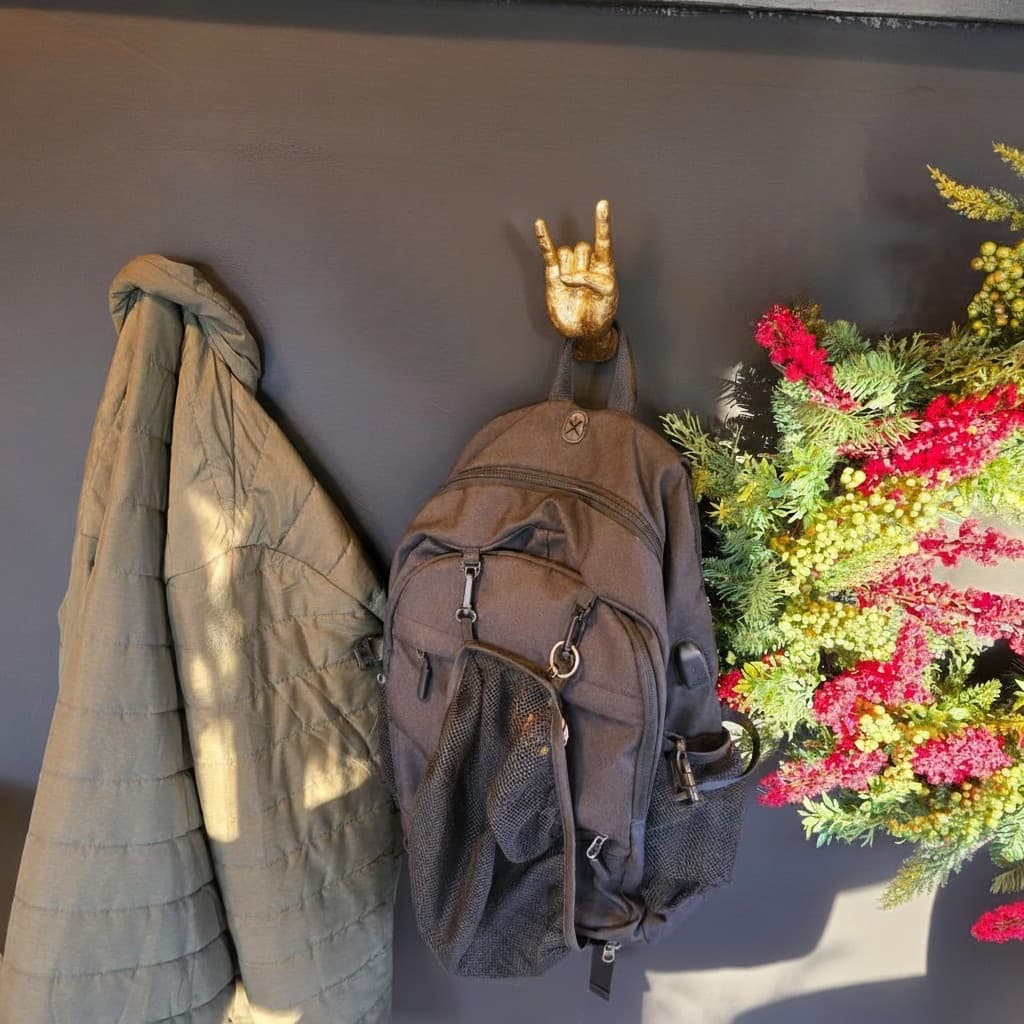 Customer photo of gold rock hand used as a wall hook