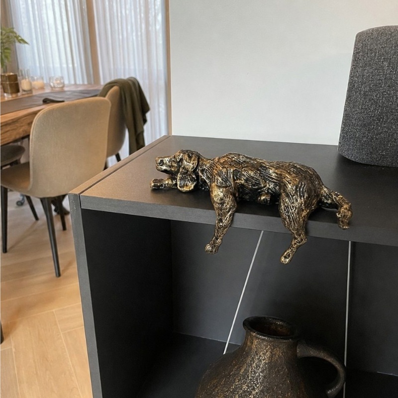 Customer review photo of lazy dog sculpture