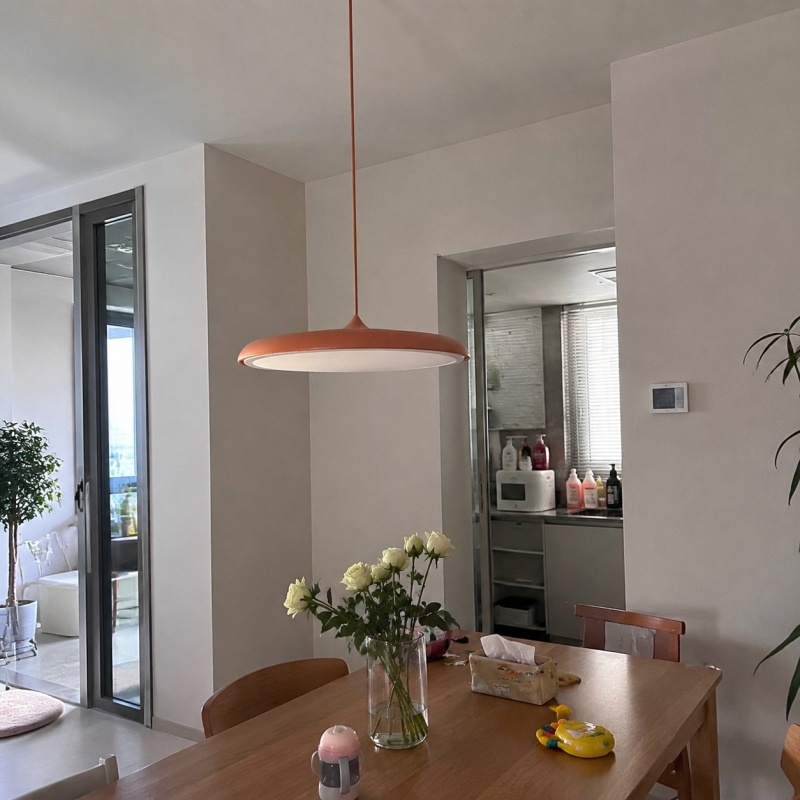 Customer room with orange Macaron pendant
