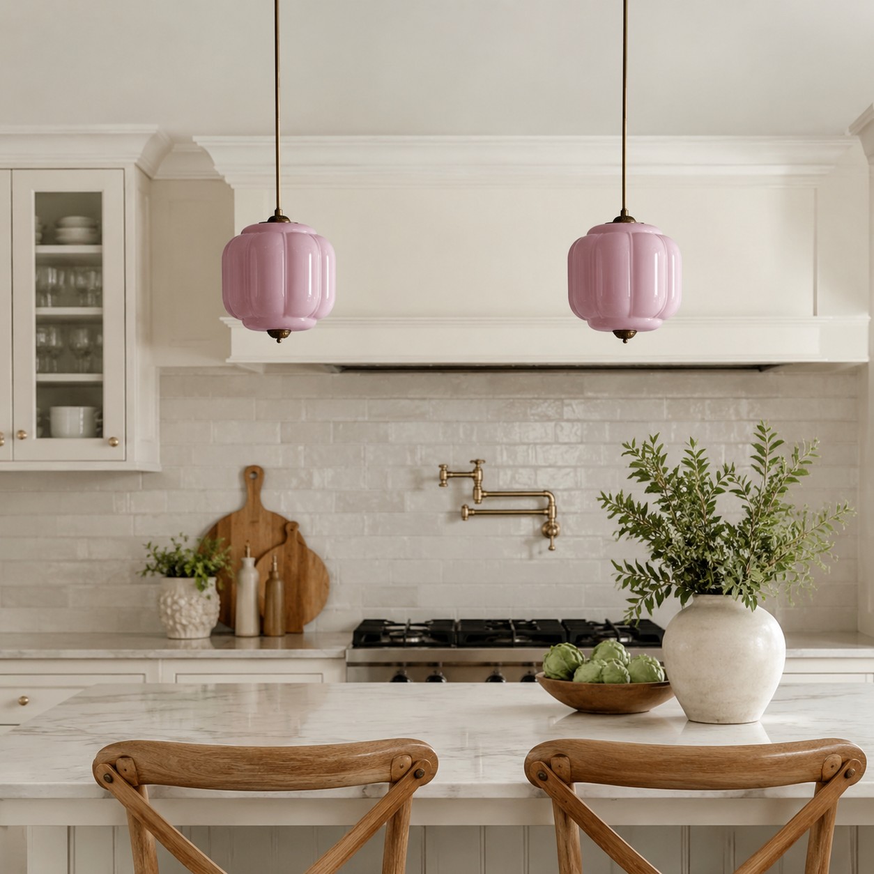 Pink Eloise pendants above a kitchen island