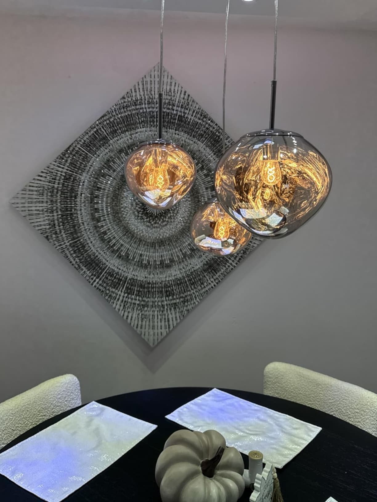 Customer photo of smoky melt pendant lights over a dining table
