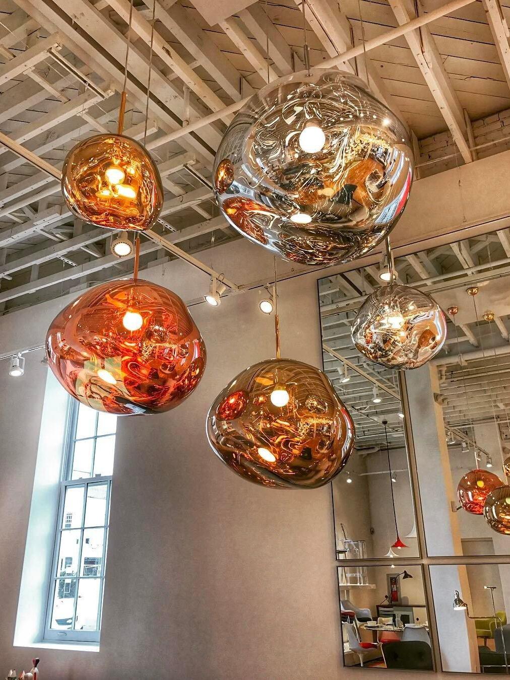 Customer photo of clear melt pendant lights glowing indoors