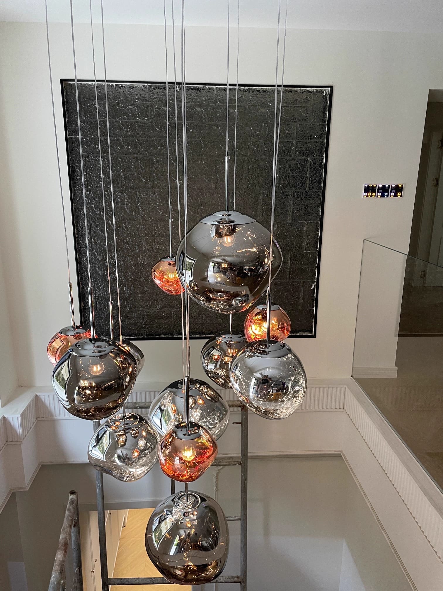 Customer photo of melt pendant light cluster above stairs