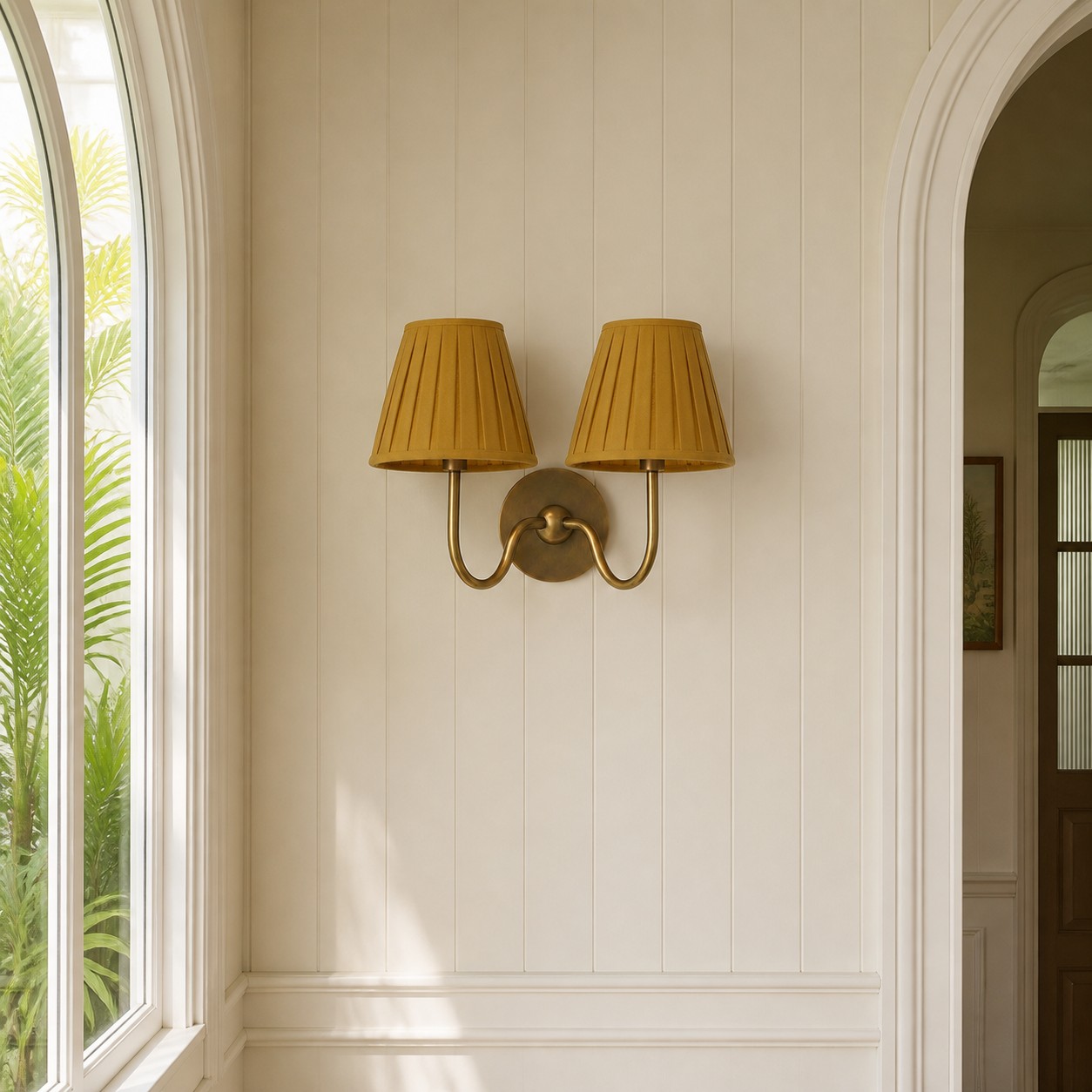 Wall lamps beside mirror