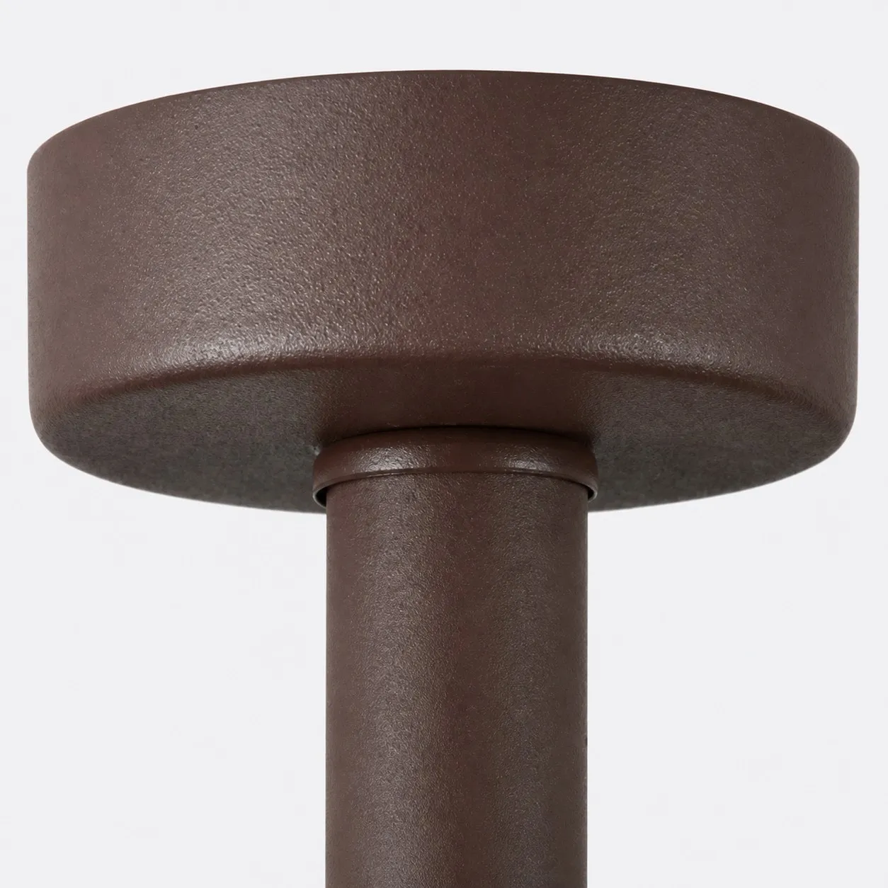 Close-up of coffee finish metal canopy