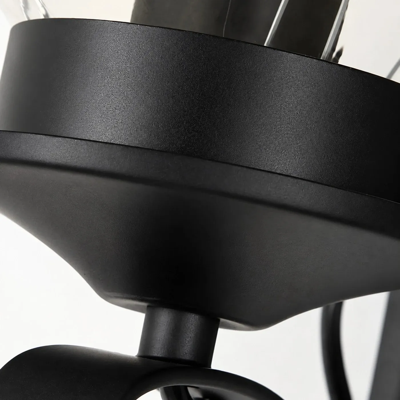 Matte black metal finish and mounting cup close view